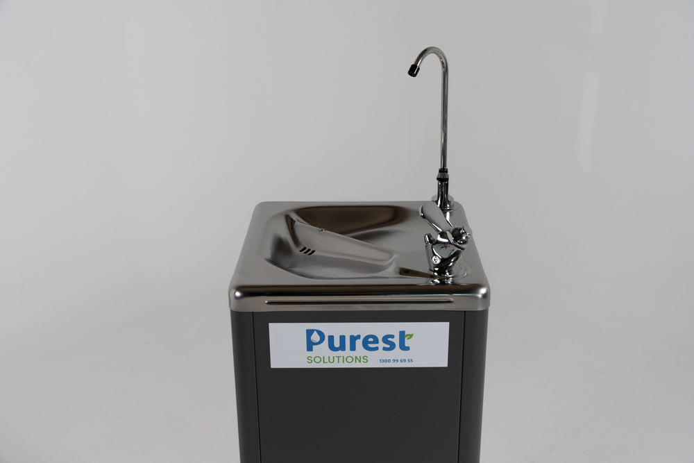 Filtered water bubbler tap close-up — chilled drinking water for commercial spaces
