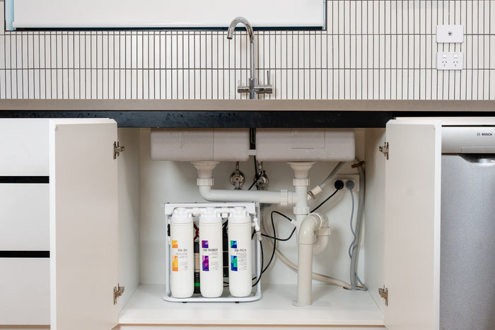 Reverse osmosis system installed under kitchen sink — Purest Solutions Melbourne