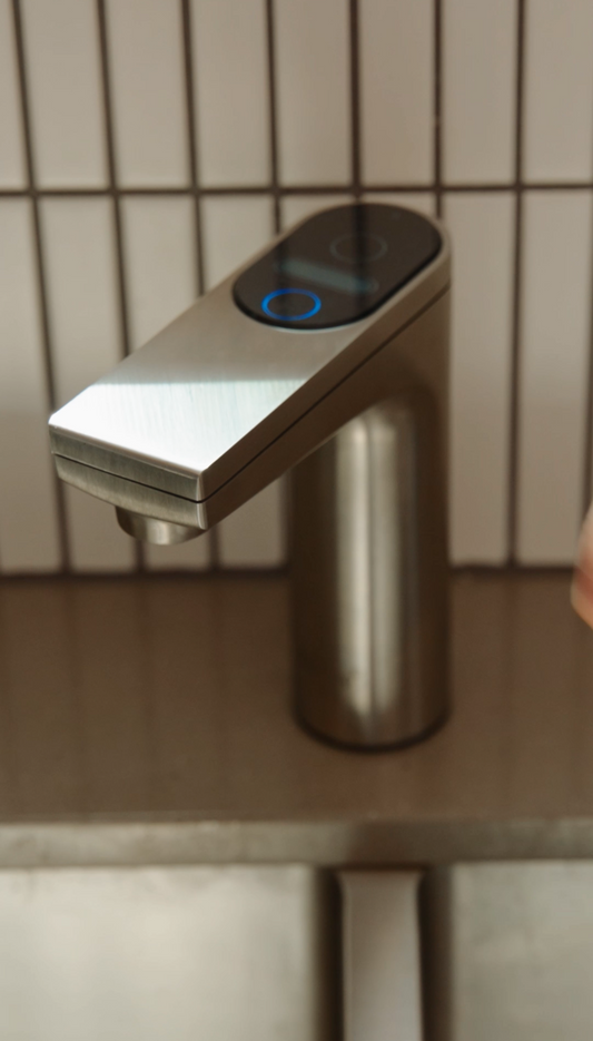 Under-sink hot and cold filtered tap close-up — instant boiling water Melbourne